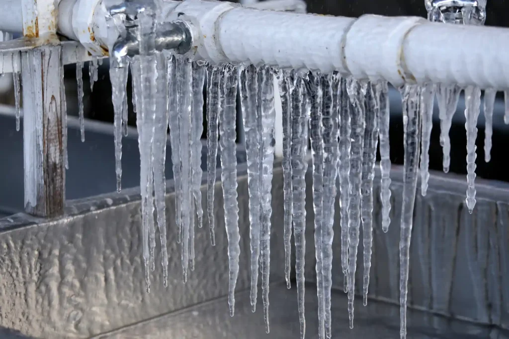 frozen pipes in need of repair outside